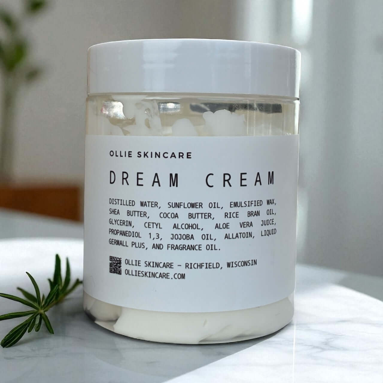 Dream Cream Body Moisturizer in a jar, featuring a blend of shea butter, cocoa butter, and natural oils.