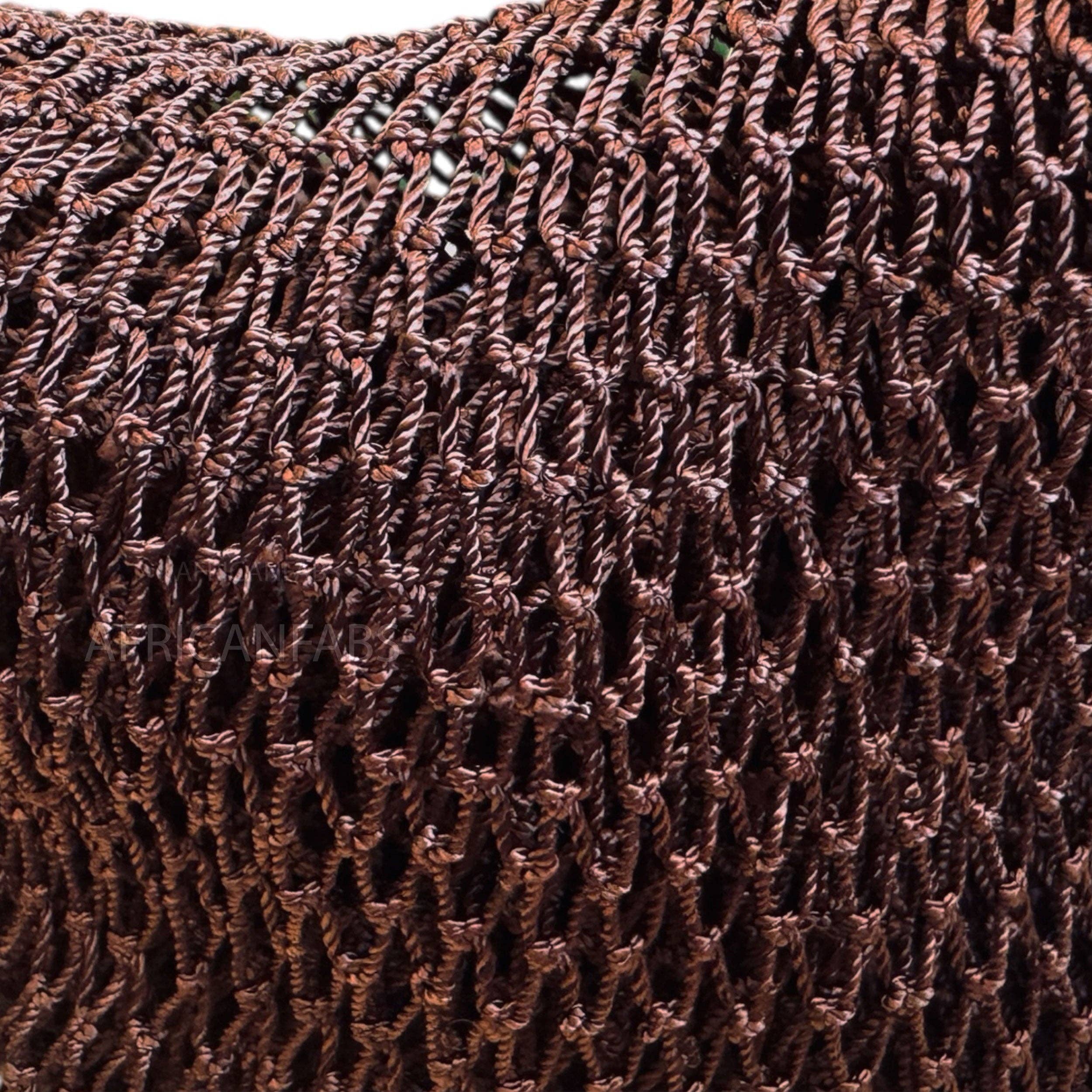 Traditional African Net Sponge texture close-up, showcasing the intricate nylon weaving for effective cleansing.