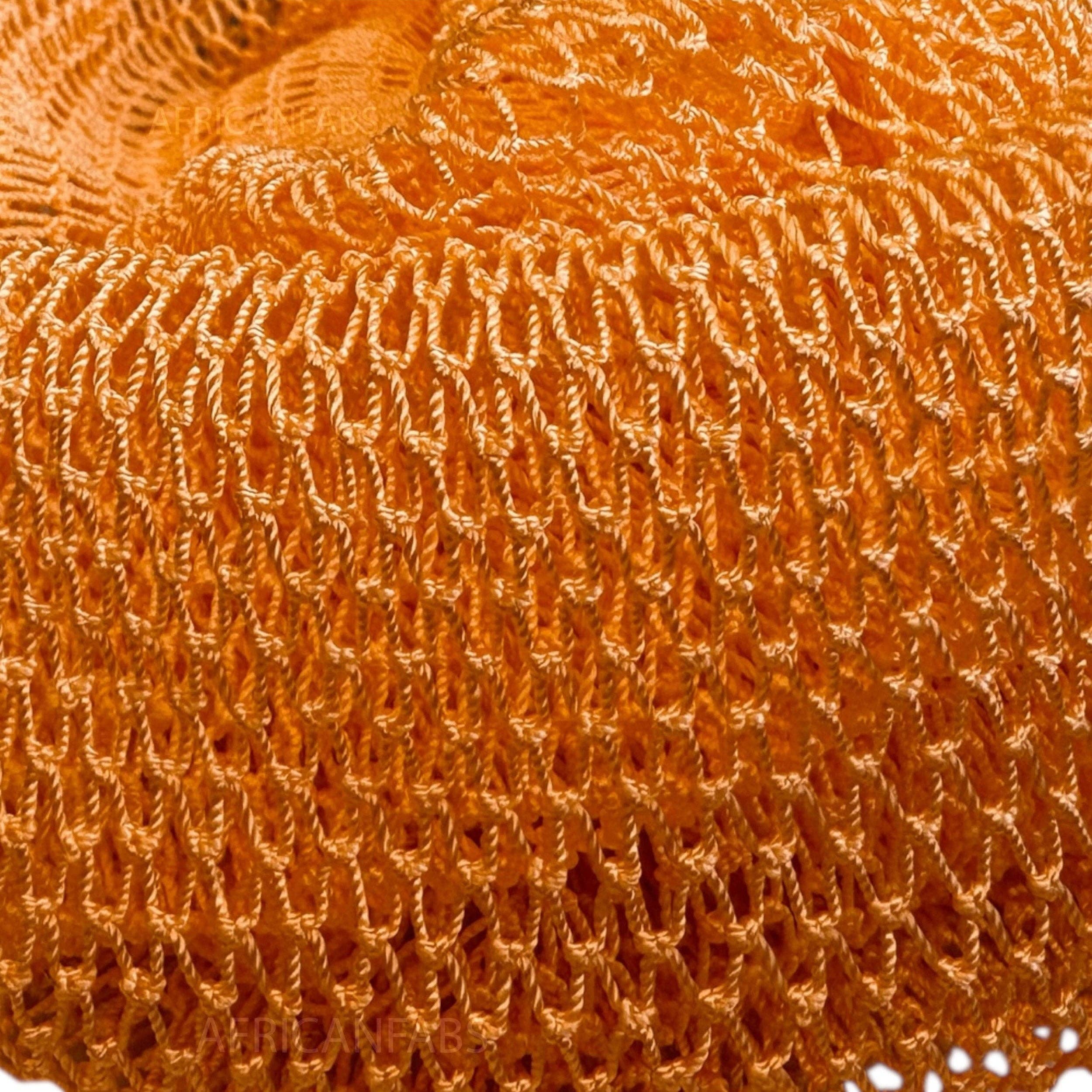 Traditional African Net Sponge in vibrant orange, made from 100% nylon, perfect for deep cleansing and exfoliating.