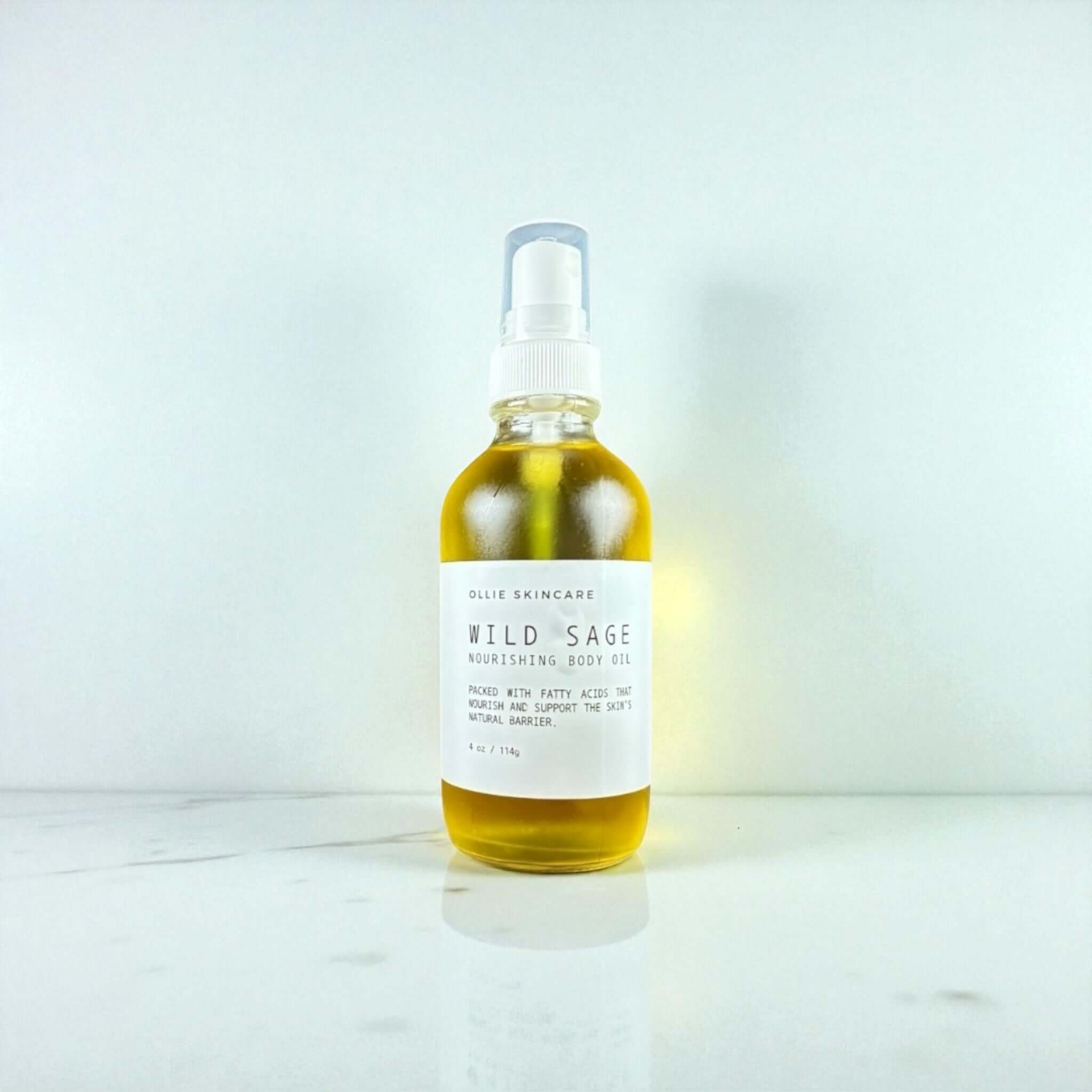 Body Oil in a glass bottle with spray top, featuring nourishing formula for skin hydration and radiance.