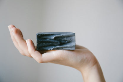 Handmade activated charcoal goat milk facial soap by Ollie Skincare