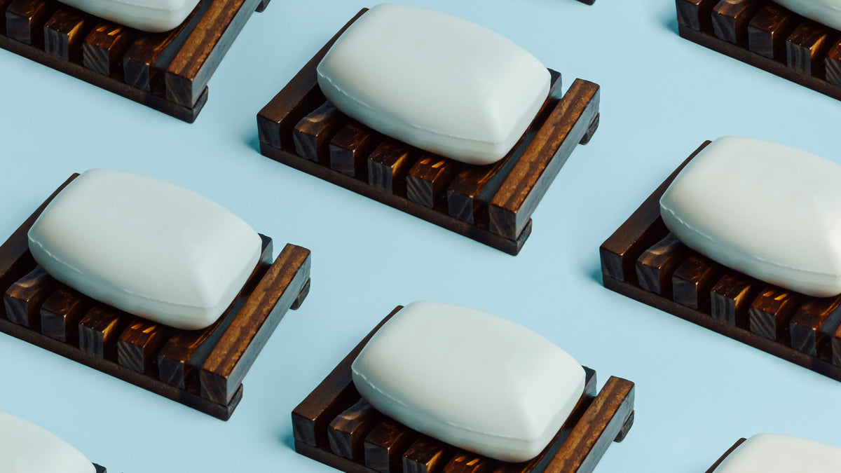 Bars of soap on a wooden surface
