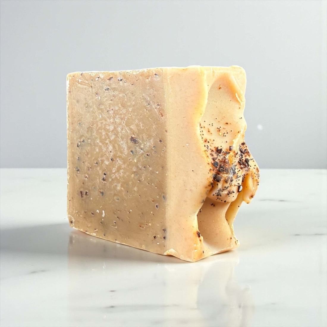 Bold Brew Coffee Soap bar showcasing its unique texture and natural ingredients for gentle cleansing and exfoliation.