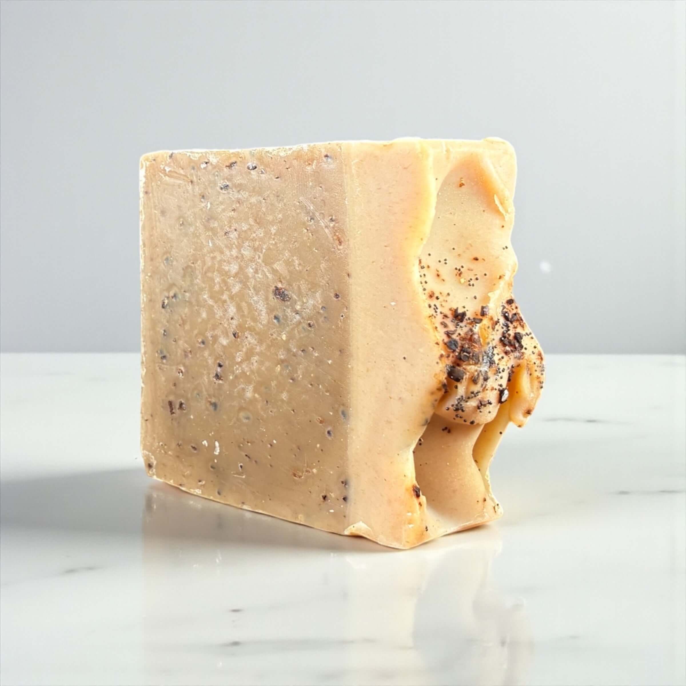 Bold Brew Coffee Soap bar showcasing its unique texture and natural ingredients for gentle cleansing and exfoliation.