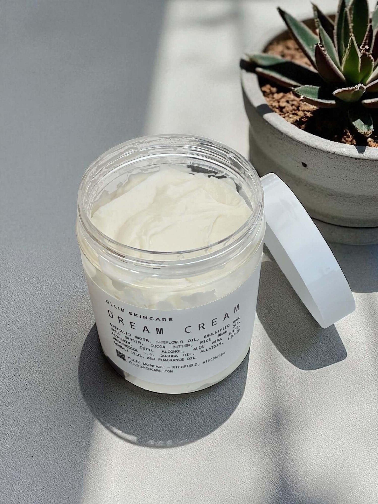 Dream Cream Body Butter in a jar, a luxurious body moisturizer for dry skin.