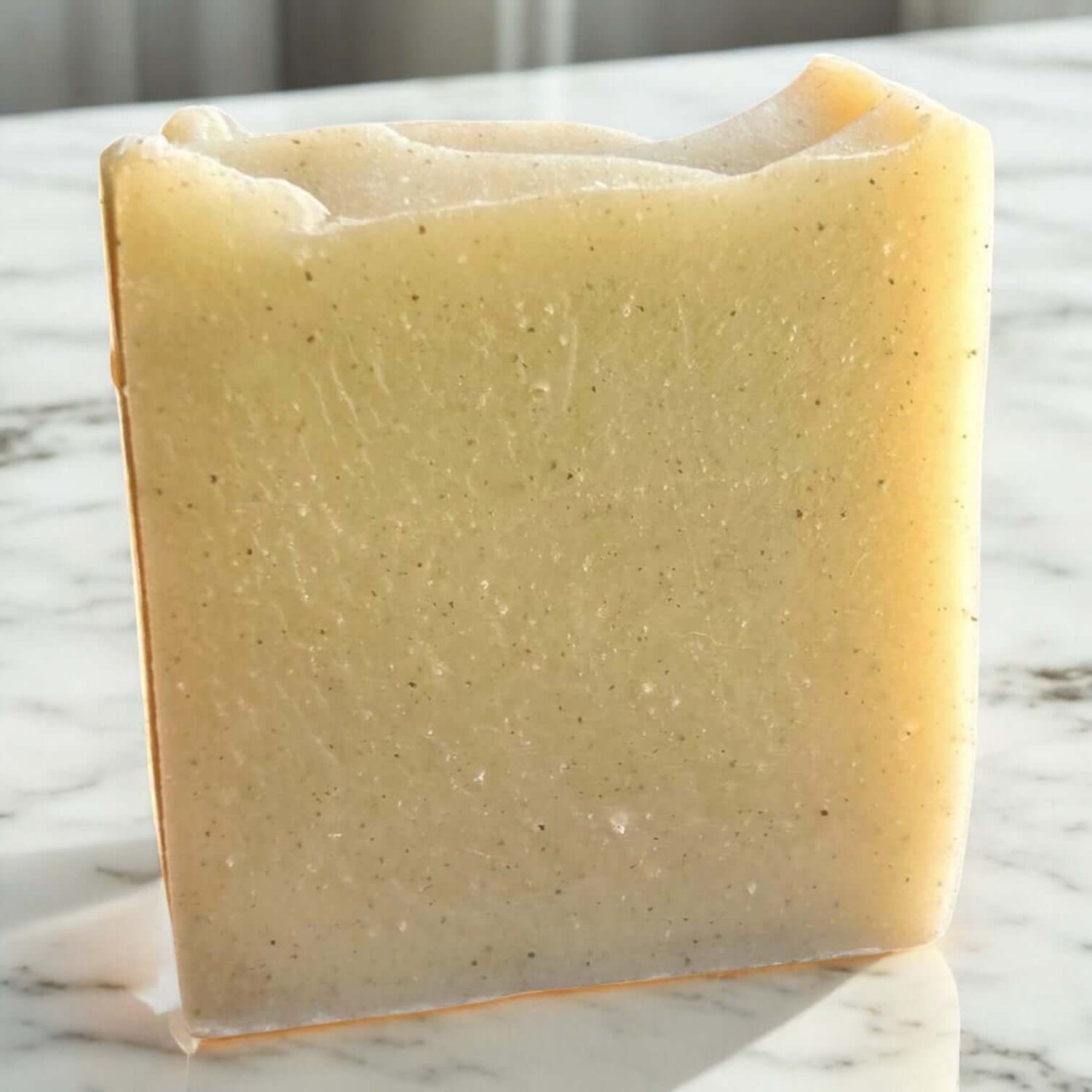 Handmade cold processed clay soap bar made with goat milk and rose kaolin clay for gentle cleansing.