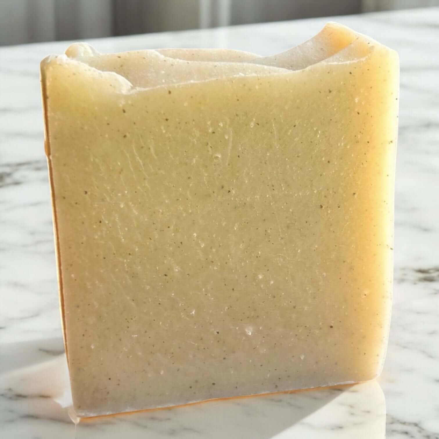 Handmade cold processed clay soap bar made with goat milk and rose kaolin clay for gentle cleansing.