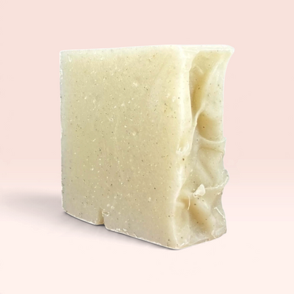 Handmade clay soap bar made with goat milk and rose kaolin clay, perfect for gentle cleansing and skin purification.