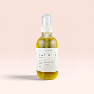 OLLIE SKINCARE Lavender nourishing body oil in a clear glass spray bottle with a minimalist white label.