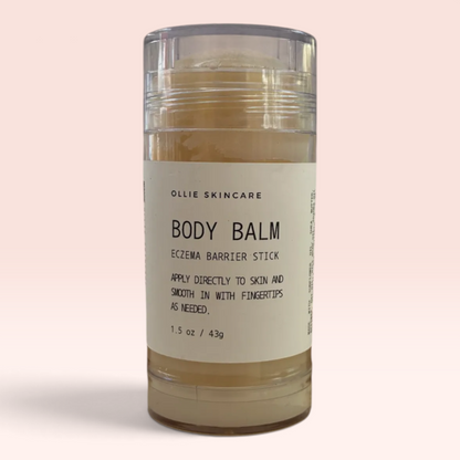 Ollie Skincare Body Balm tin, a rich, nourishing balm for dry skin.