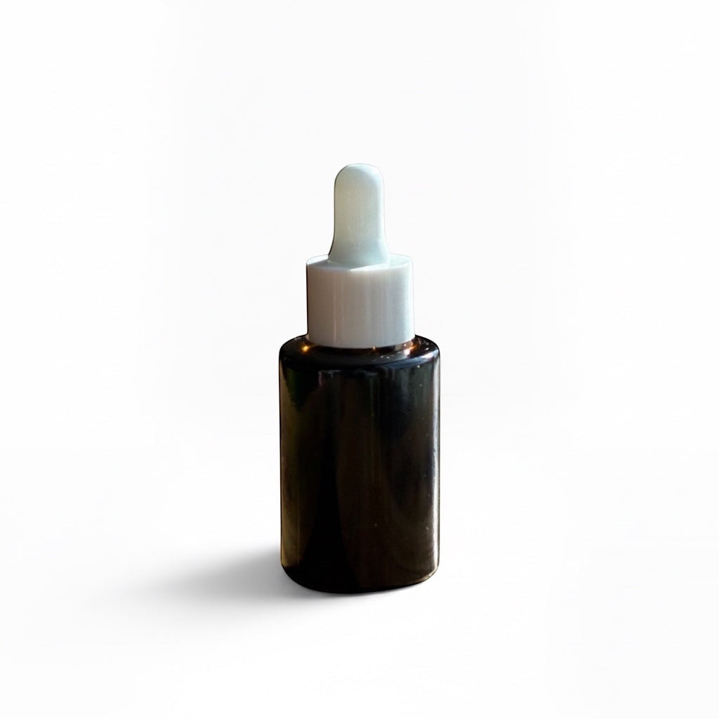 OLLIE SKINCARE Bakuchiol Facial Oil in a dark glass dropper bottle with a white cap against a white background