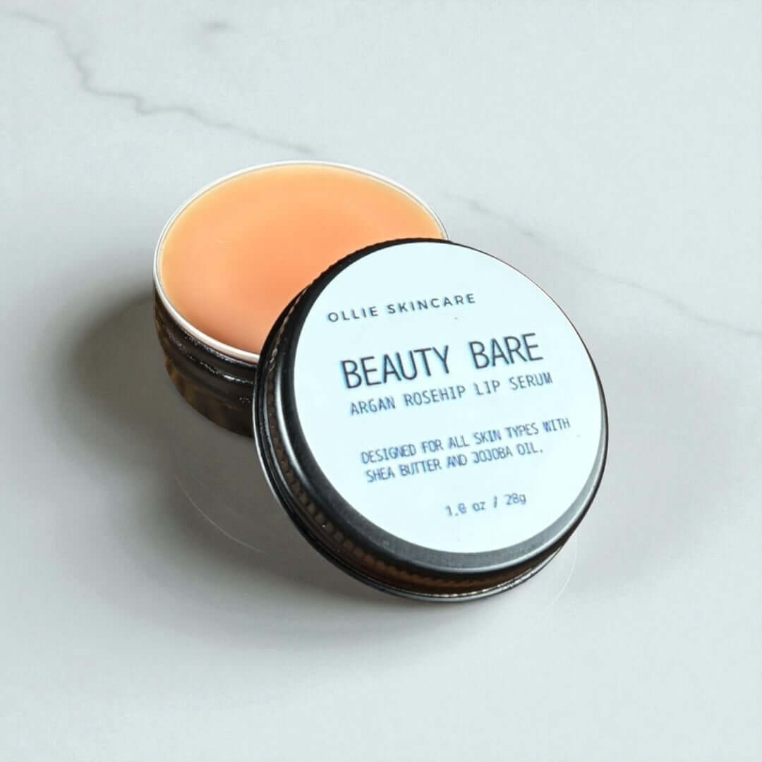 Lip Serum in a sleek tin can, showcasing its nourishing formula designed for all skin types.