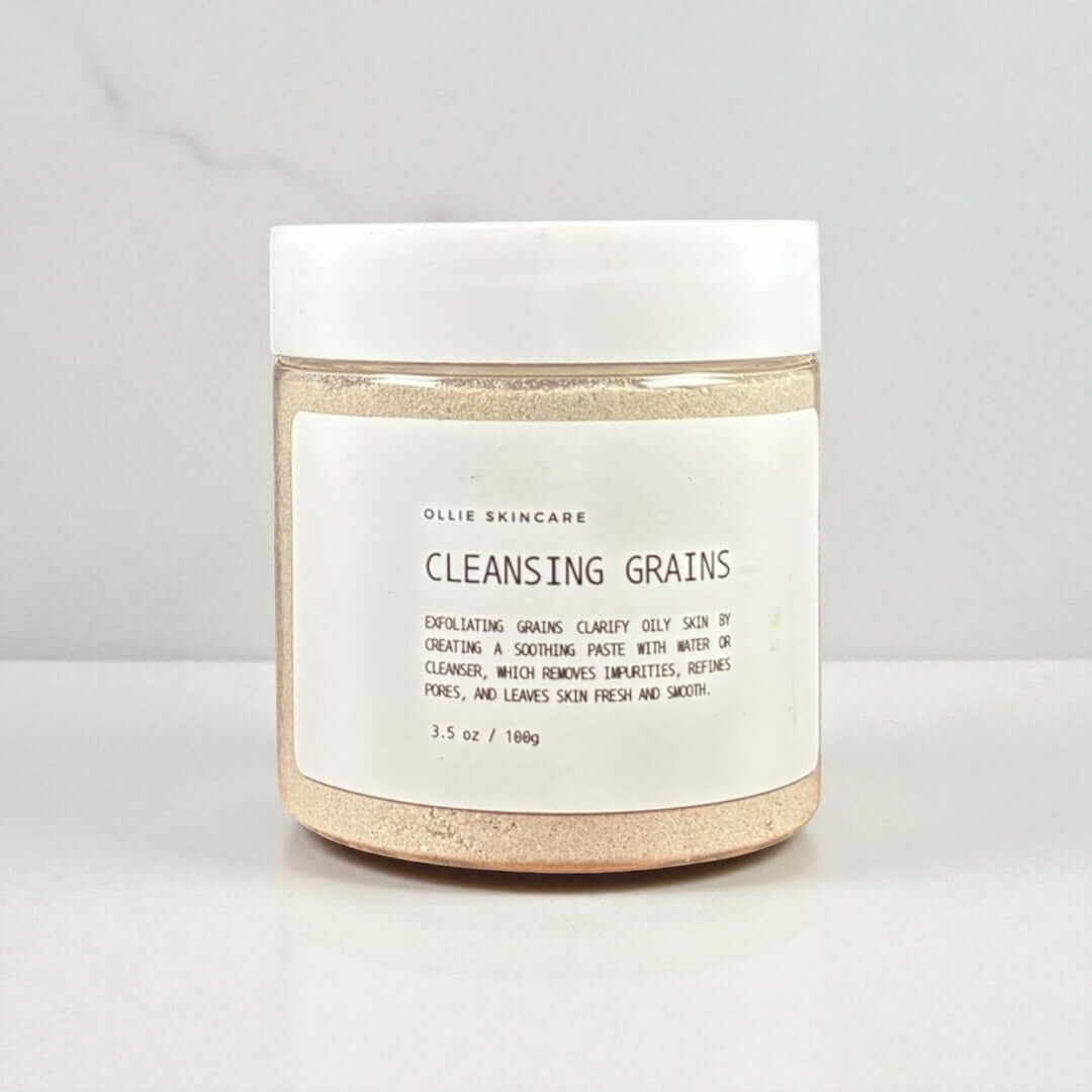 Cleansing Grains jar with eco-friendly ingredients for gentle exfoliation and glowing skin.