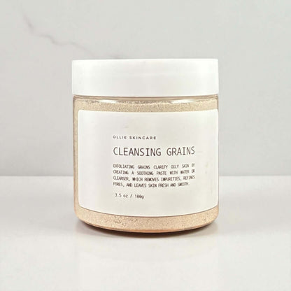Cleansing Grains jar with eco-friendly ingredients for gentle exfoliation and glowing skin.