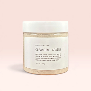 Cleansing Grains jar with eco-friendly ingredients for gentle exfoliation and glowing skin.