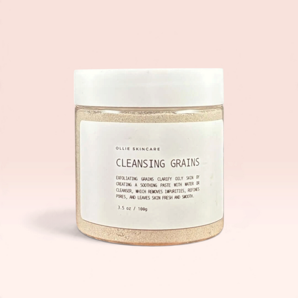 Cleansing Grains jar with eco-friendly ingredients for gentle exfoliation and glowing skin.