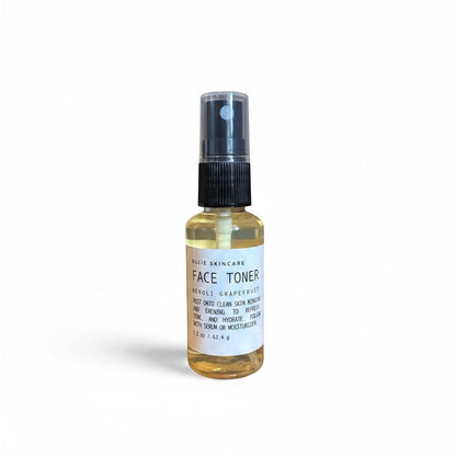 OLLIE SKINCARE Neroli Grapefruit Face Toner Mist in a clear spray bottle for refreshing and hydrating skin.