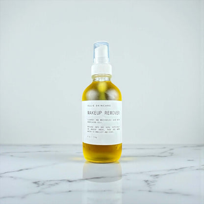 Ollie Skincare Makeup Remover in a glass bottle, effectively dissolves makeup and nourishes skin.