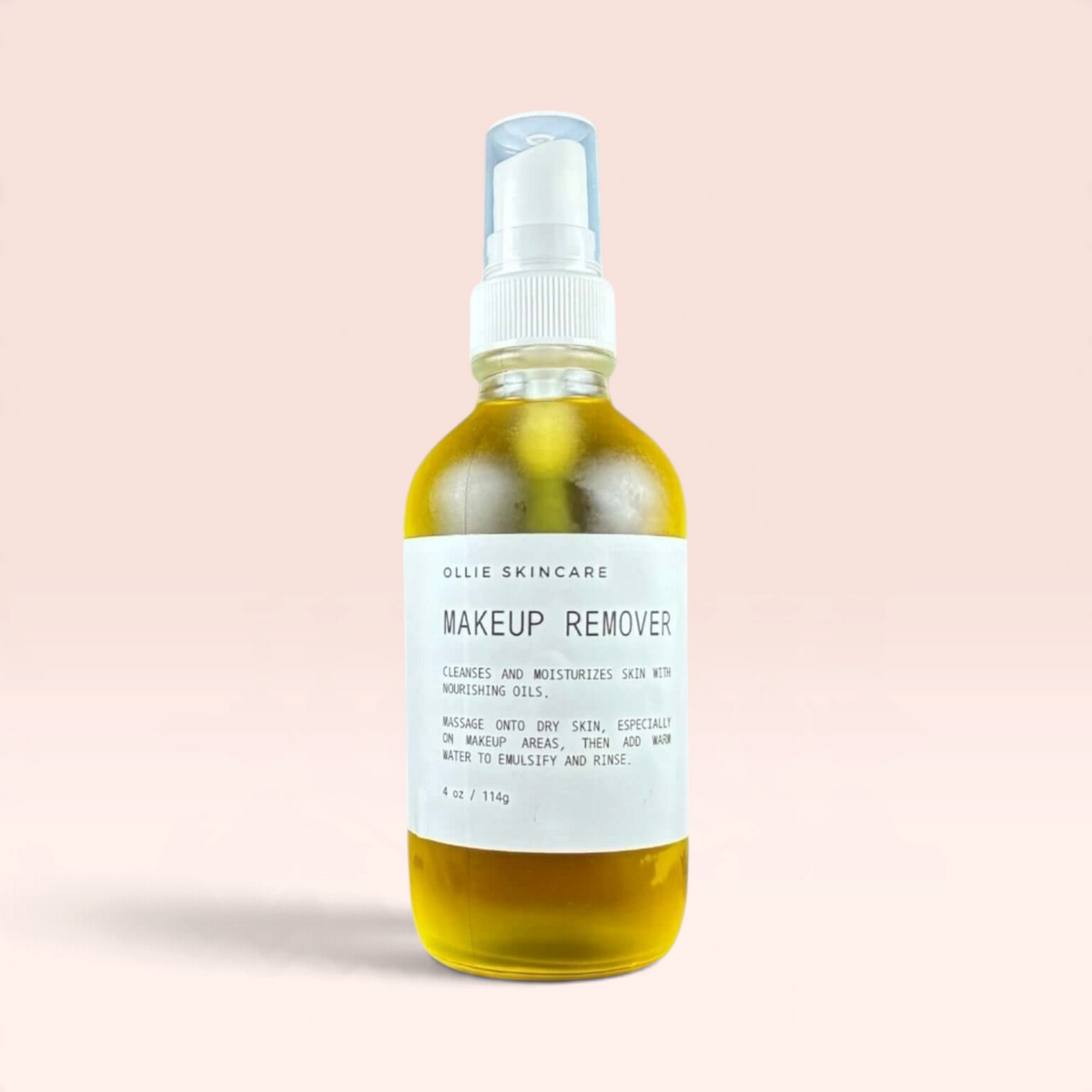 Ollie Skincare Makeup Remover in a glass bottle, effectively dissolves makeup and nourishes skin.