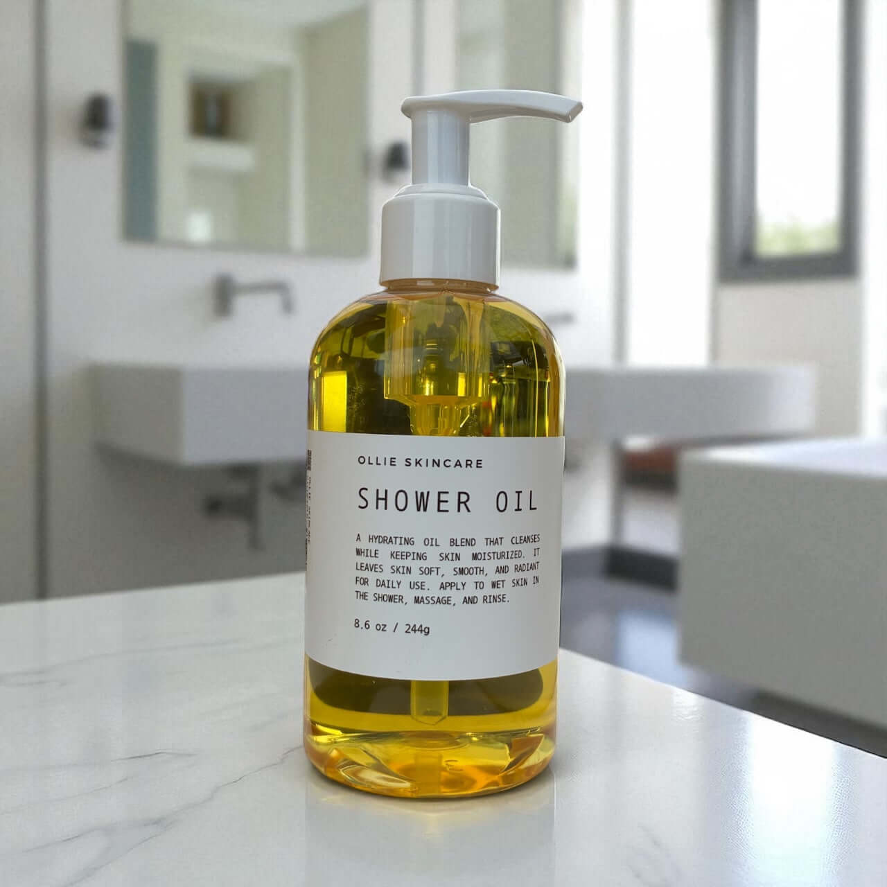 Ollie Skincare Shower Oil bottle displayed in a bright bathroom setting, promoting moisture and luxurious skin care.