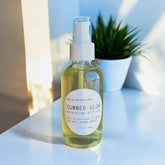 Summer Glow nourishing Body Oil in a glass bottle, essential fatty acids for skin hydration and radiance.