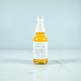 Ollie Skincare Vitamin C Serum in a yellow glass bottle for brightening and hydrating skin.