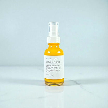 Ollie Skincare Vitamin C Serum in a yellow glass bottle for brightening and hydrating skin.