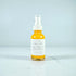 Ollie Skincare Vitamin C Serum in a yellow glass bottle for brightening and hydrating skin.