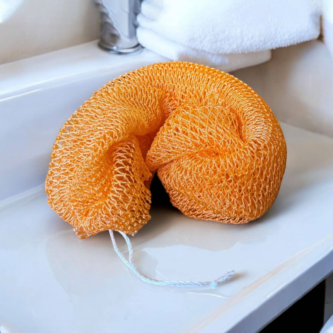 Traditional African Net Sponge, 100% nylon, ideal for deep cleansing and exfoliating skin.