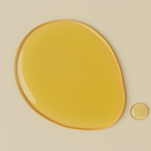 Yellow ceramic plate on a beige background